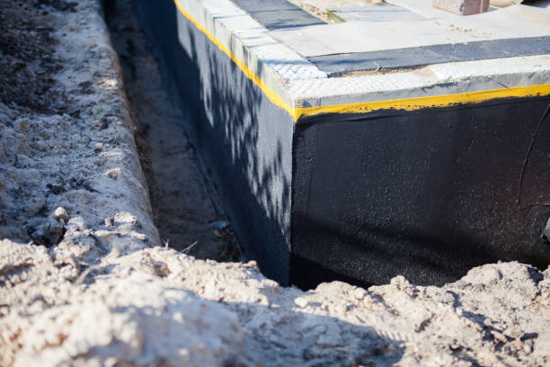 Professional Emergency Waterproofing technician working in Hanceville, AL